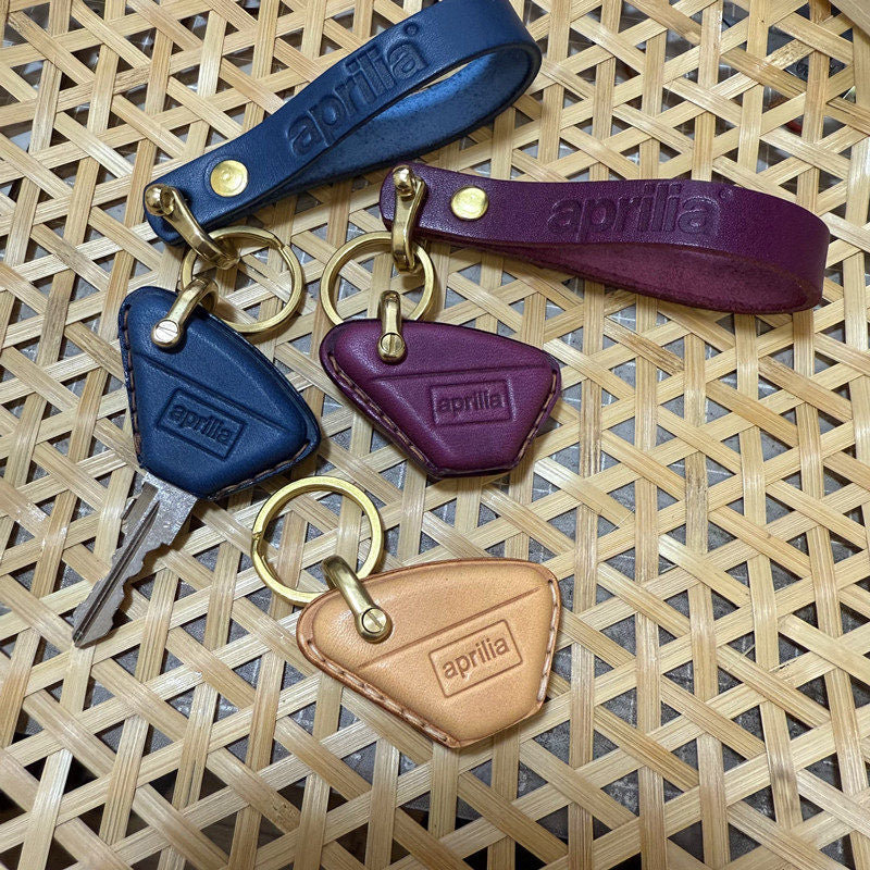 Aprilia RS457 leather key case and lanyard set with brass ring