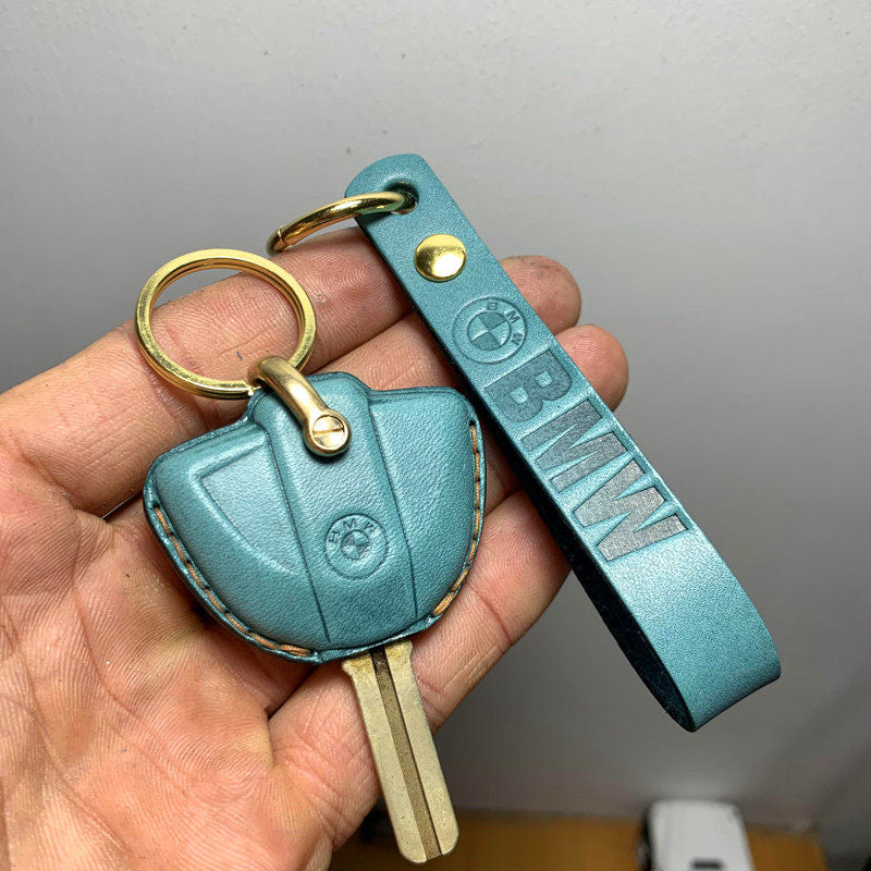 BMW R1200GS and G310GS handmade leather key case shown with motorcycle keys