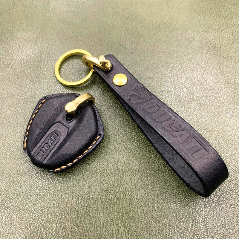 Close-up of vegetable-tanned cowhide stitching on Ducati Monster 696 key fob cover