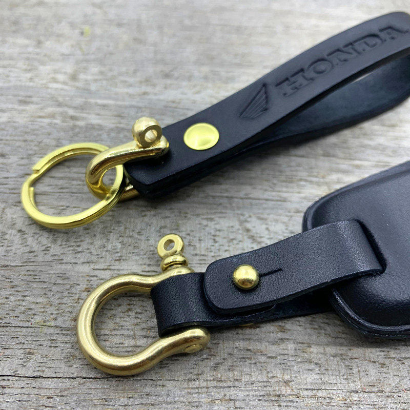 Side view of handmade leather key fob cover for Honda Forza and Lead125