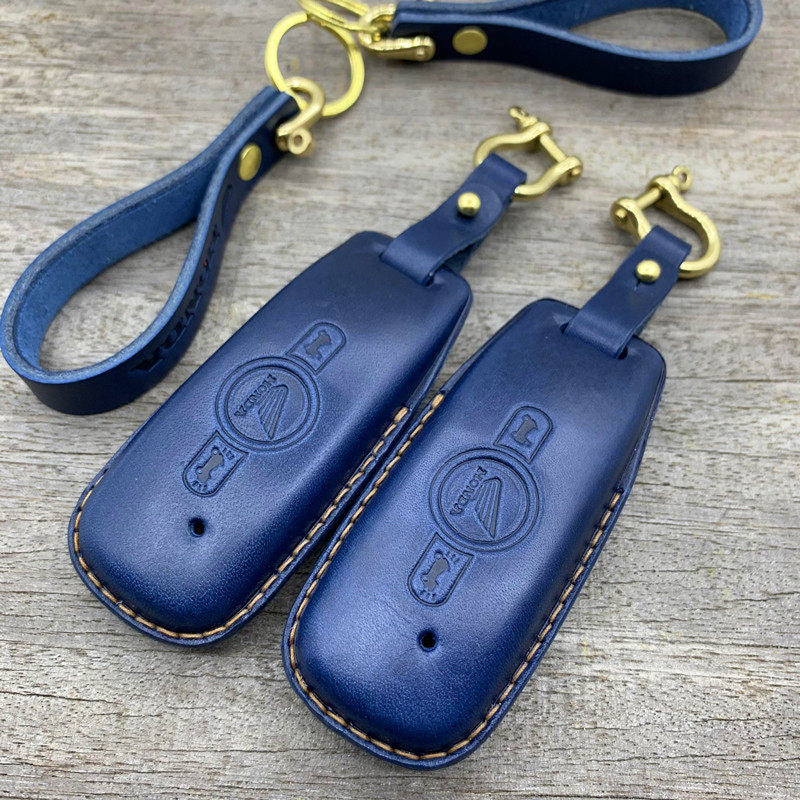 Close-up of embossed Honda logo on vegetable-tanned leather key cover for Gold Wing GL1800