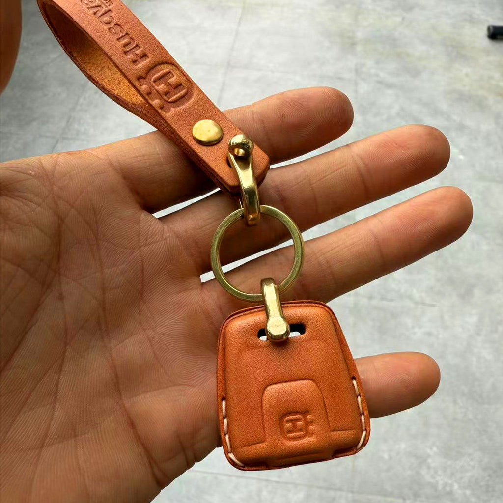 Husqvarna 250 and 901 motorcycle leather key fob cover in multiple colors