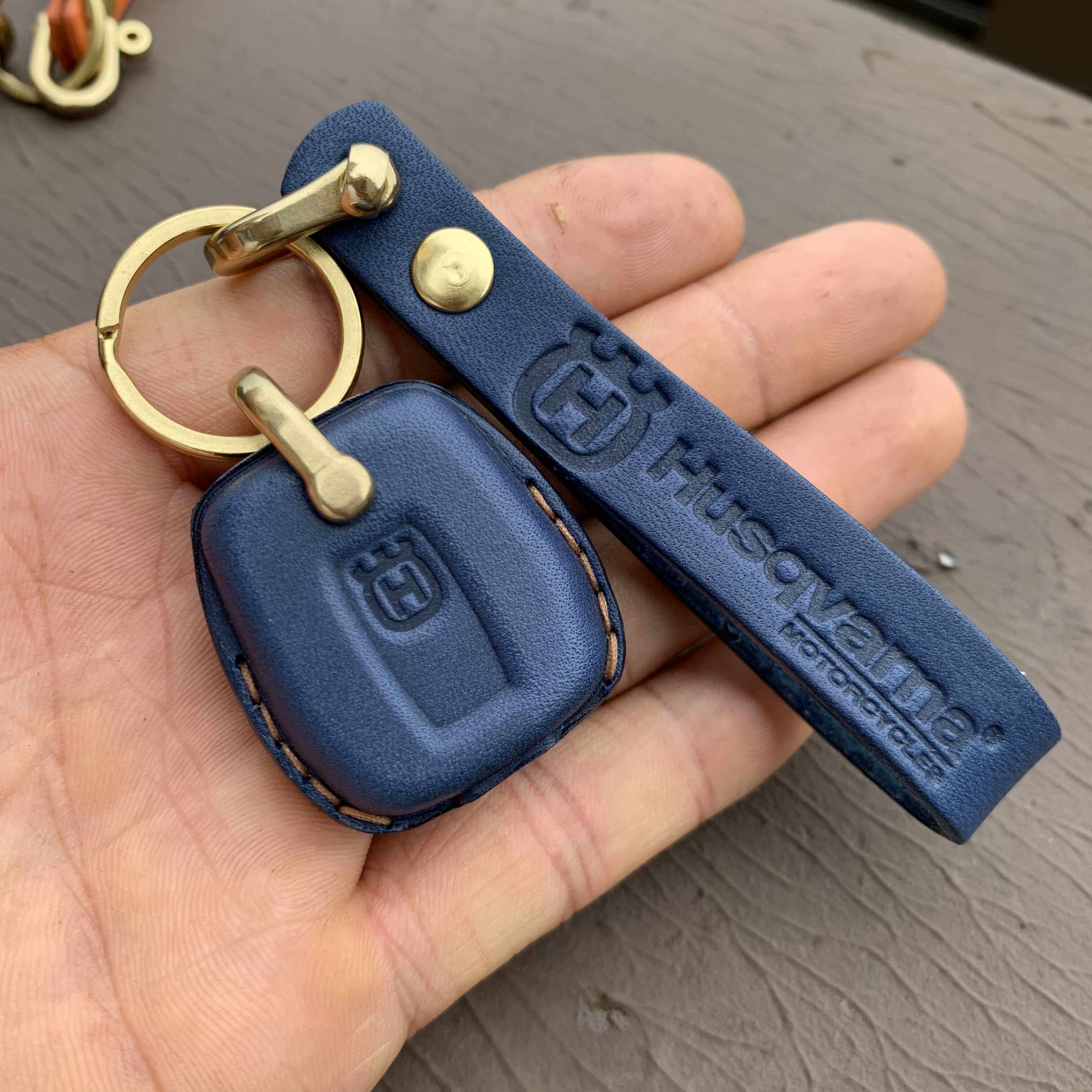 Husqvarna 401 motorcycle leather key fob cover available in multiple colors