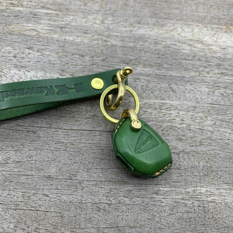 Close-up of full-grain cowhide and brass hardware on Kawasaki ZX4R ZX6R key case