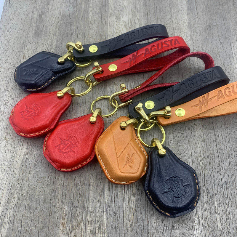 MV Agusta Type A key with handmade leather key case on red motorcycle