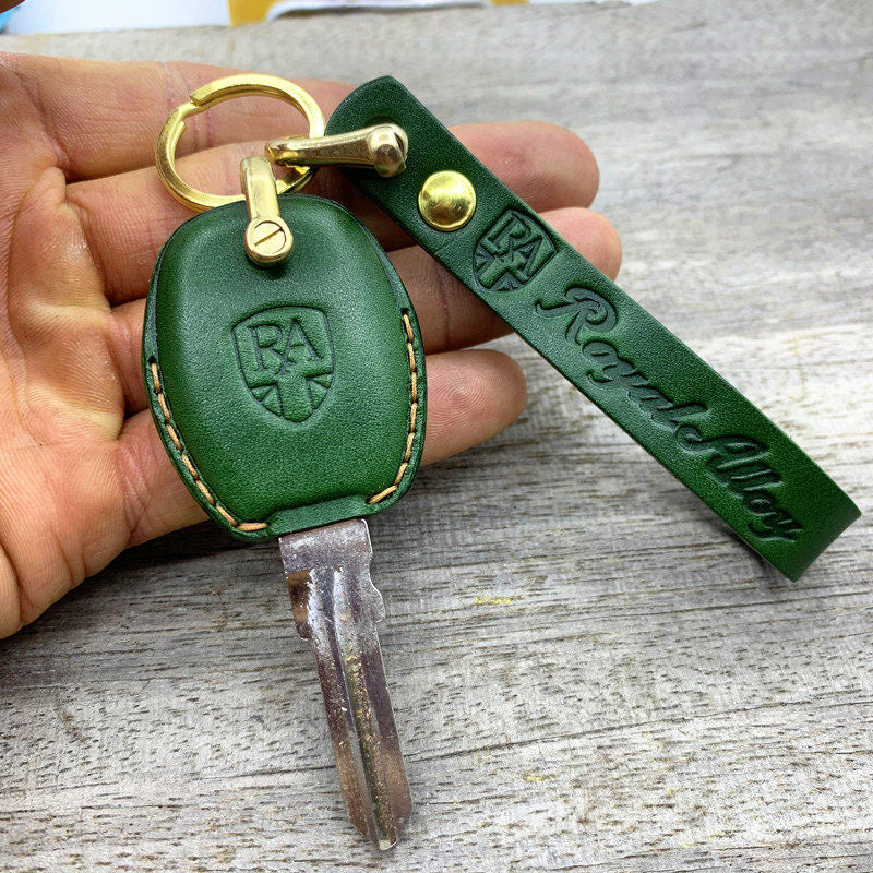 Royal Alloy GP150 handmade leather key cover in green with brass ring