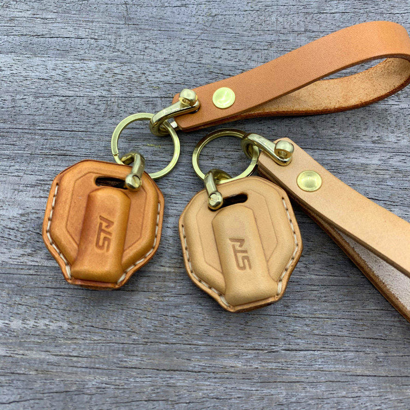 SYM Stalker three-wheeler leather key fob cover available in multiple colors