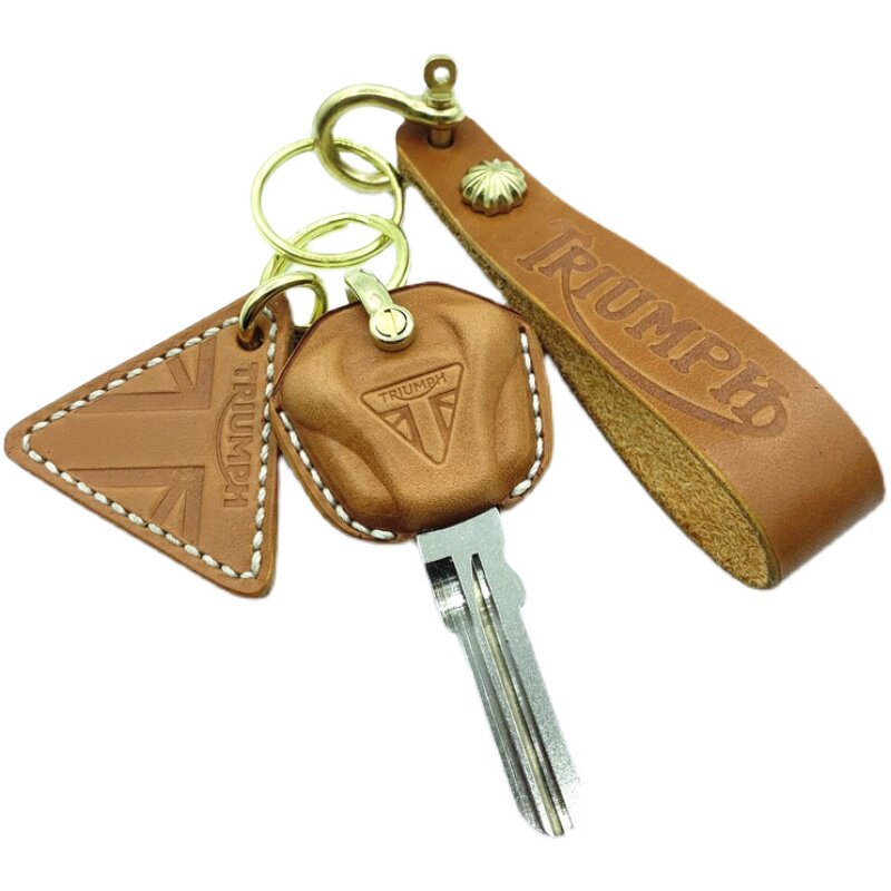 Embossed Triumph logo detail on handmade leather key case
